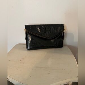 The Limited black magnetic/zipper clutch